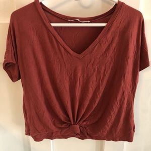 SOLD Rust loose crop top with knot detail